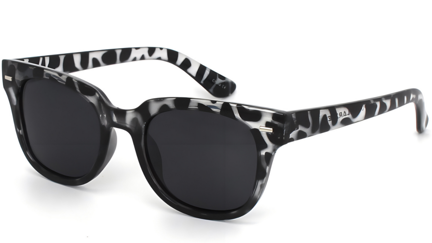 Sunglasses with black and white patterned frame on a white background