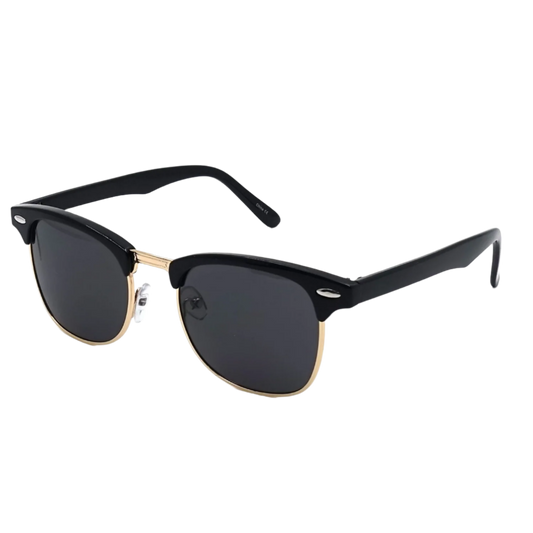 Black sunglasses with gold frames on a white background
