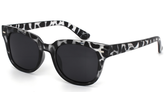 Sunglasses with black and white patterned frame on a white background