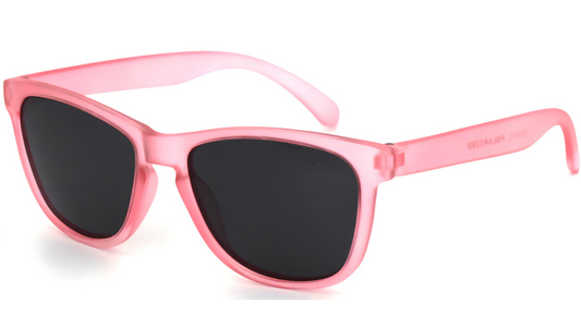 Pink sunglasses with black lenses on a white background